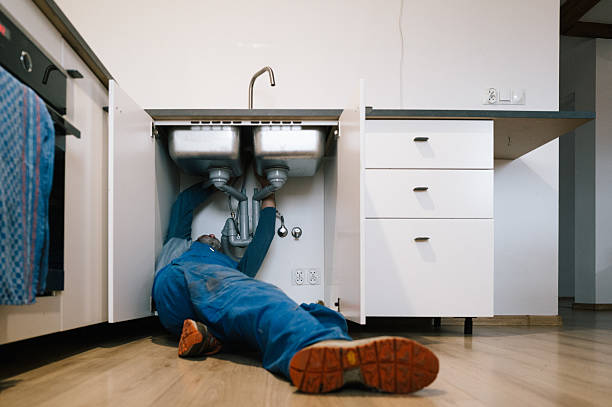 Professional Plumbing technician working in Carlyle, IL